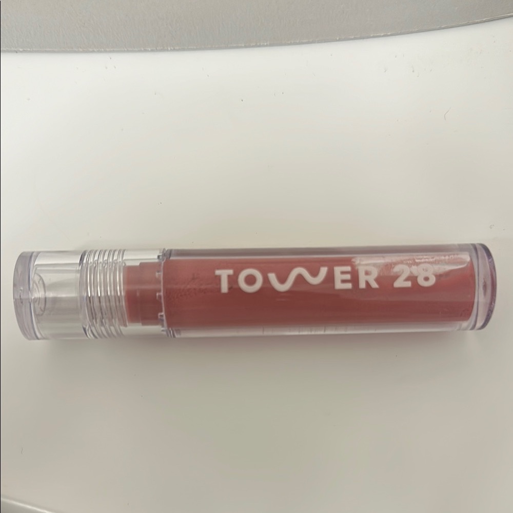 Tower 28 Pink Lip Balm Gloss in pistachio